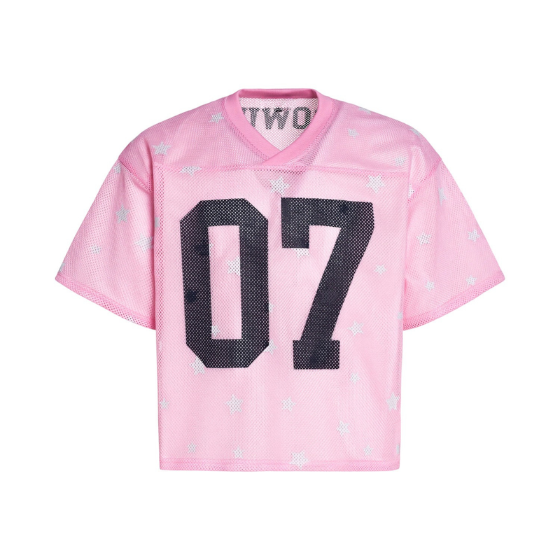 Pink mesh jersey with white star print and oversized black 07 varsity number on the front