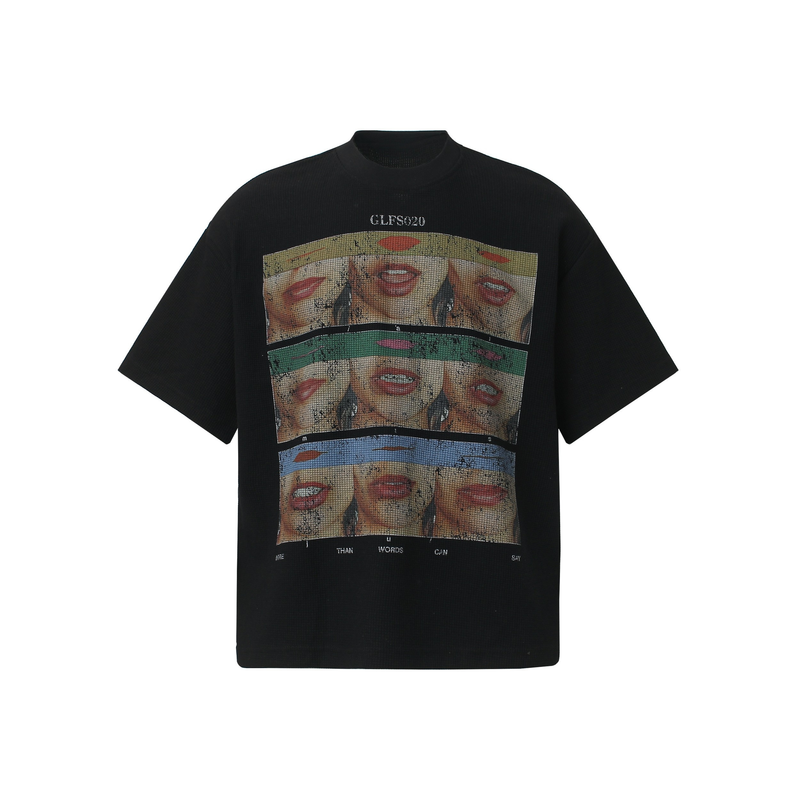 Black streetwear tee with collage lip graphic and layered face print on the front, short sleeves, oversized fit