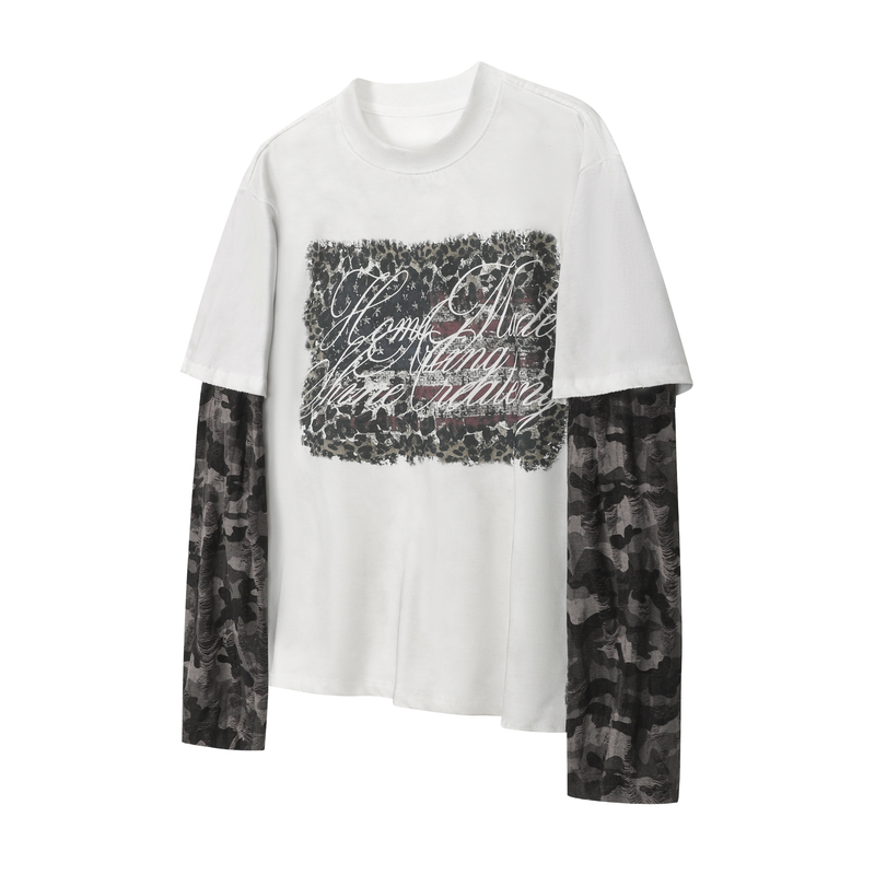 White graphic tee with camo long sleeves and layered script print on the front