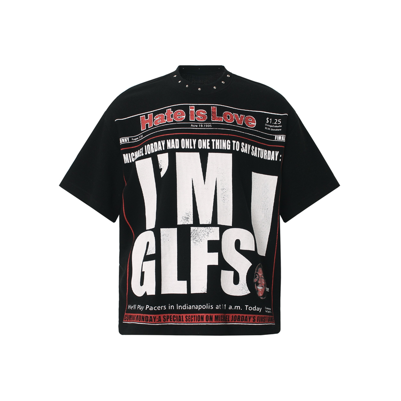 Black streetwear T-shirt with newspaper-style graphic reading Hate Is Love and oversized I M GLFS print