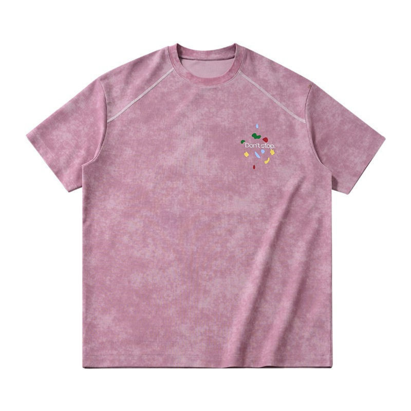 Pink vintage wash graphic tee with small Dont stop print on the chest and a relaxed streetwear fit
