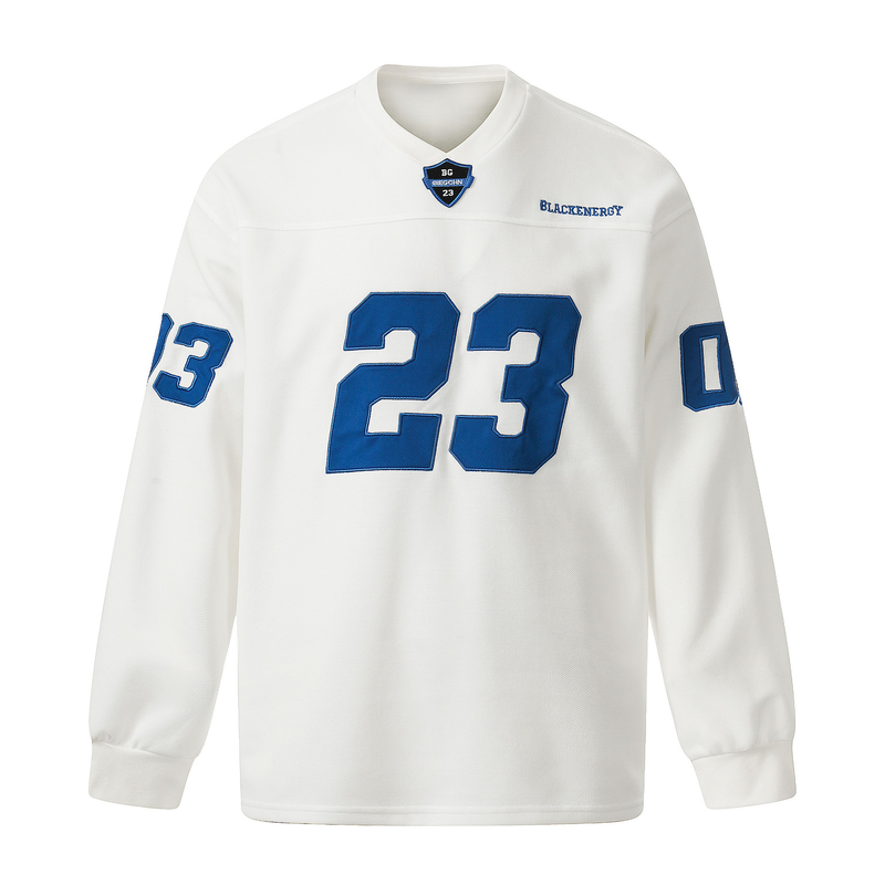 White long sleeve tee with blue varsity number 23 and small chest patch, front view