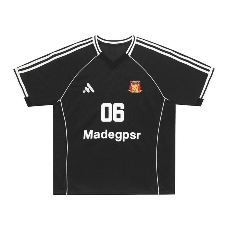 Black streetwear football jersey with white trim, number 06, and chest logos on a clean white background
