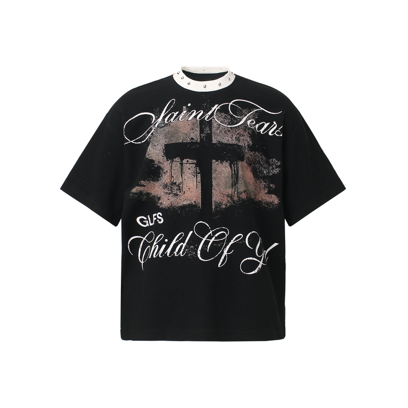 Black oversized gothic tee with studded collar, distressed cross graphic, and Saint Tears script text on the front
