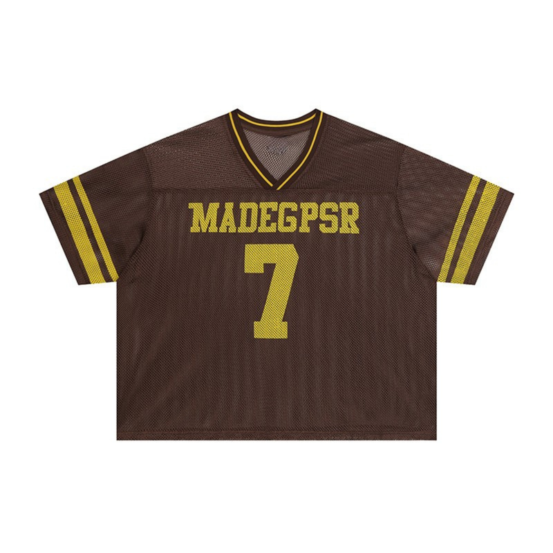 Brown retro mesh football jersey with yellow trim, number 7, and MADEGPSR lettering on the front