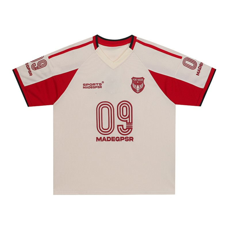 White and red MADEGPSR 09 performance soccer jersey with V-neck, short sleeves, and bold front graphic print