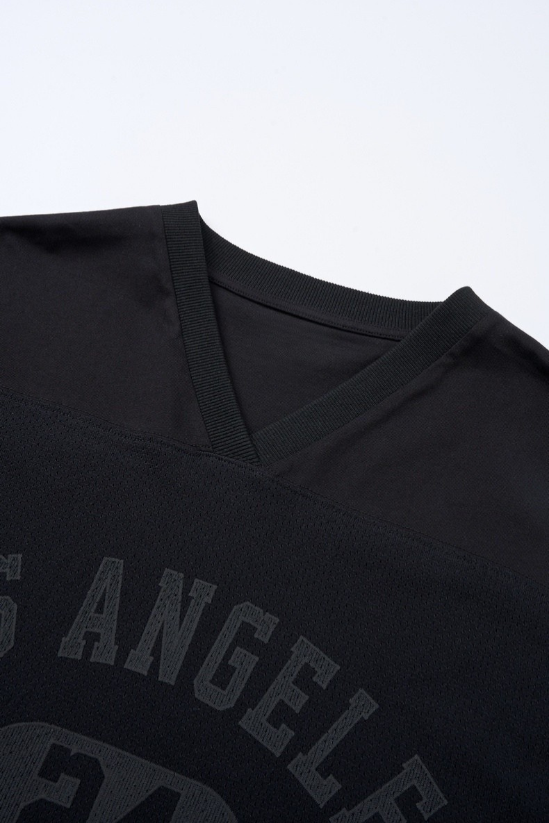 Black V-neck mesh tee with ribbed collar and faded Los Angeles graphic print on the chest