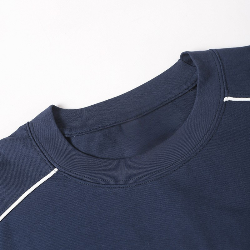 Navy cotton crewneck tee with white piping detail and a clean athletic streetwear finish