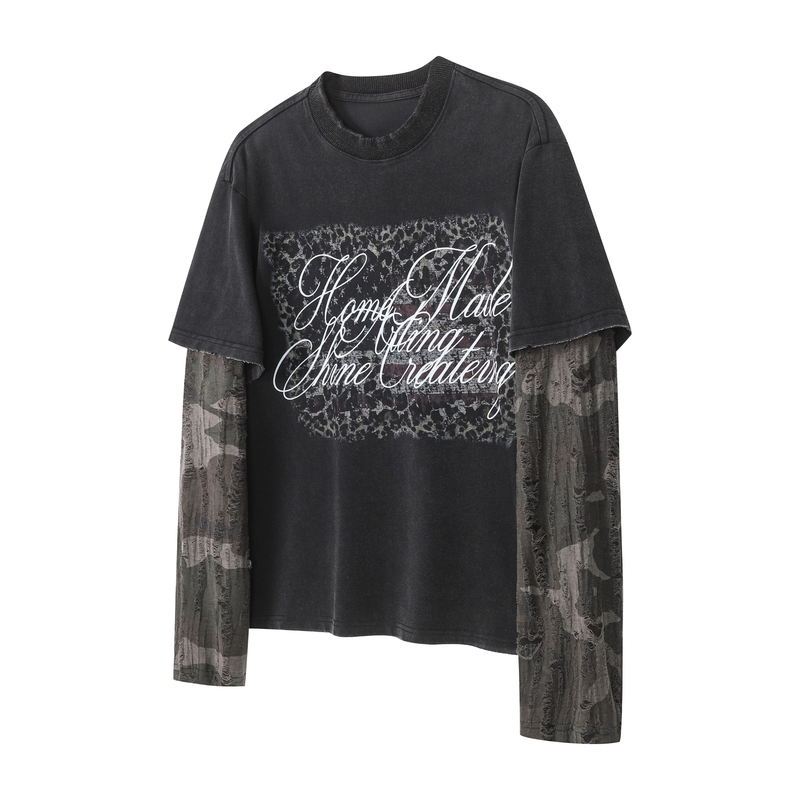 Black graphic tee with camo long sleeves and layered script print on the front