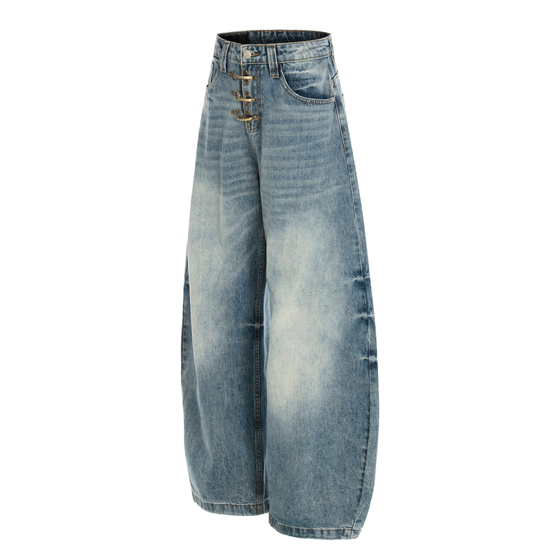 Angled front view of light wash wide-leg denim pants with hook fastening and curved pockets