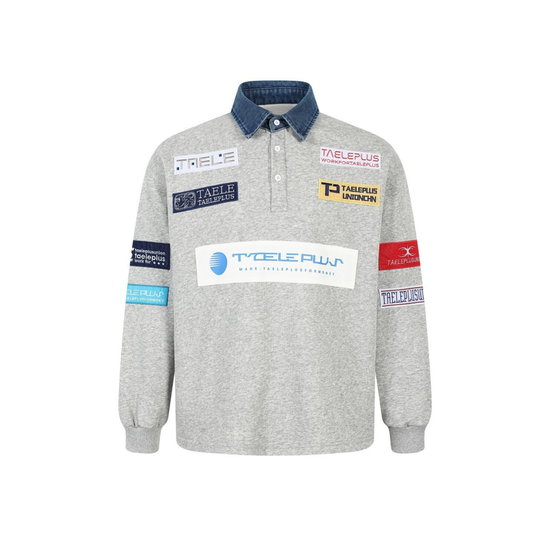 Gray patchwork polo sweatshirt with denim collar and colorful chest and sleeve patches, front view
