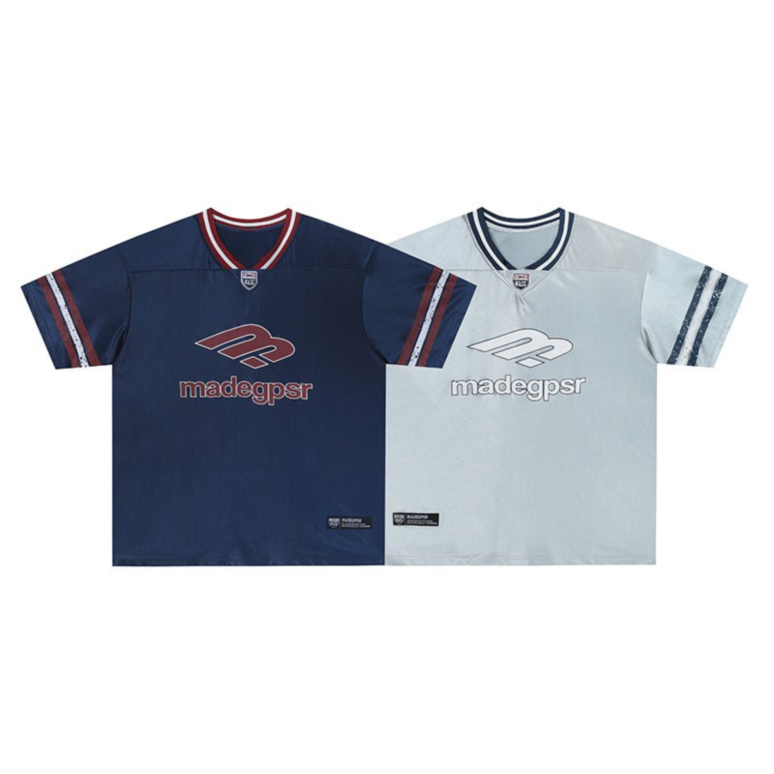 Madegpsr navy and light blue performance logo jersey tees with contrast V-neck collar and sleeve stripes, laid flat on white