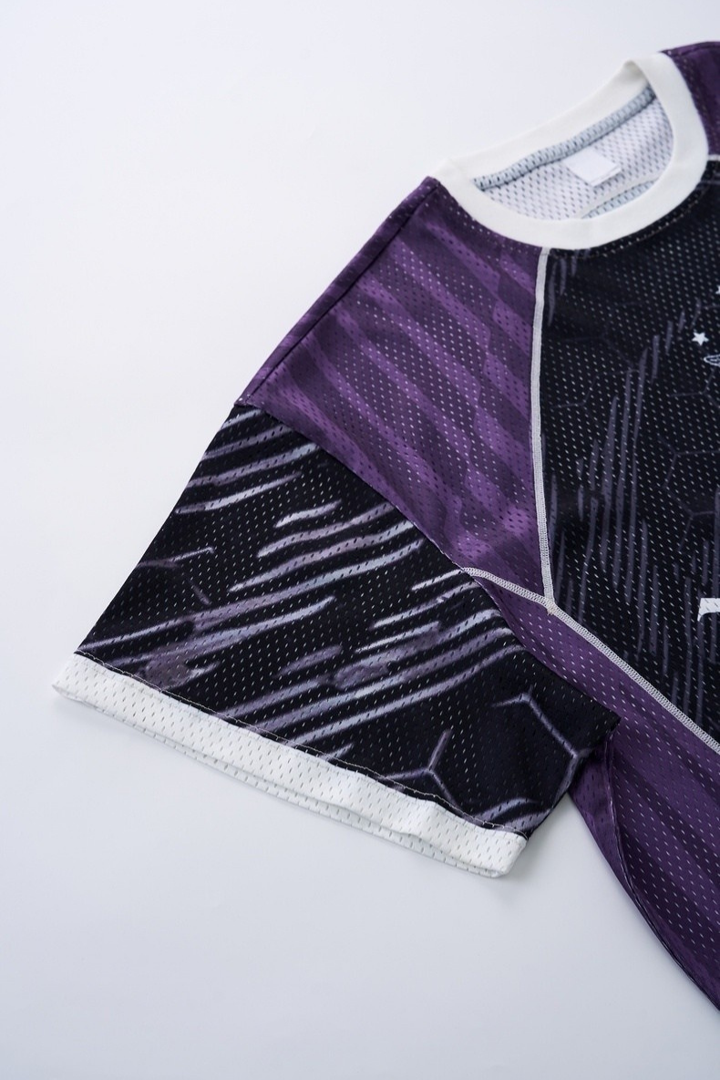 Purple and black mesh soccer jersey with white trim and gothic streetwear print on sleeve and chest