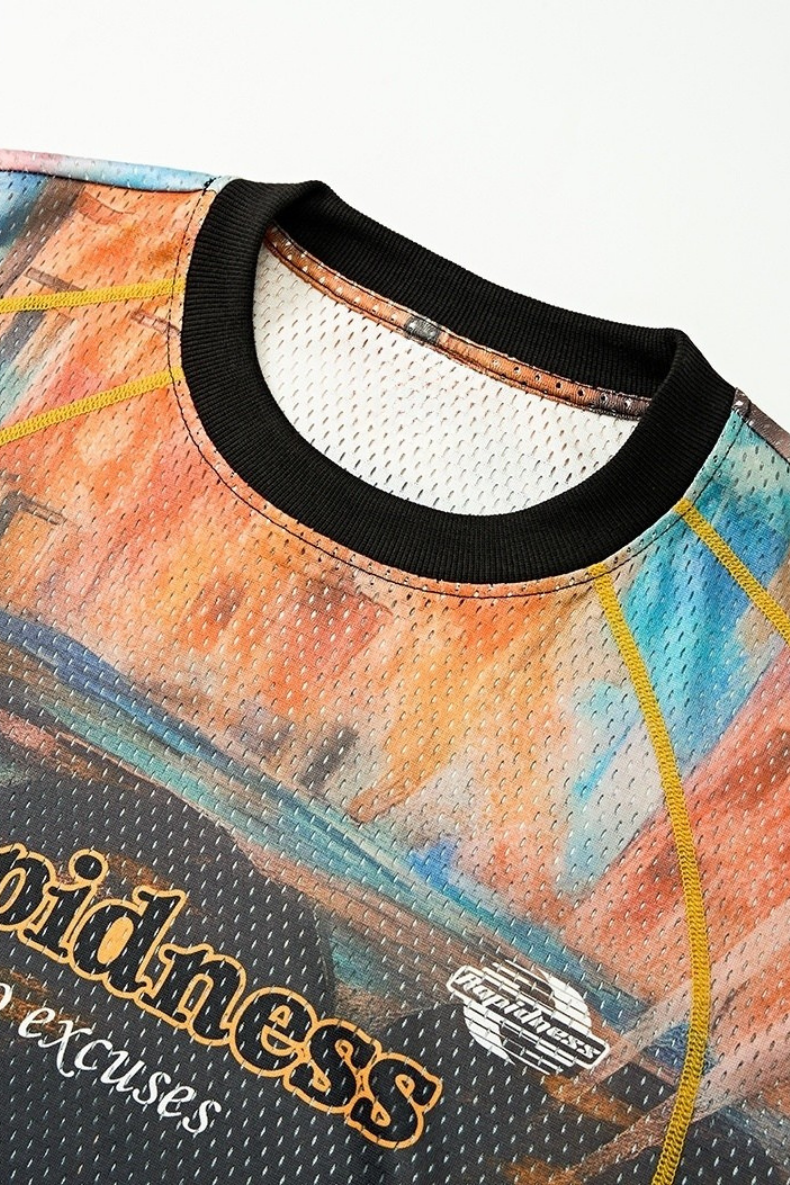 Close-up of a Seakoff racing mesh jersey with black ribbed collar and colorful streetwear graphic print