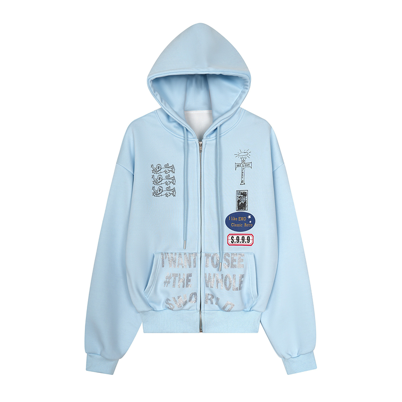 Light blue zip-up hoodie with graphic prints and rhinestone text, front view