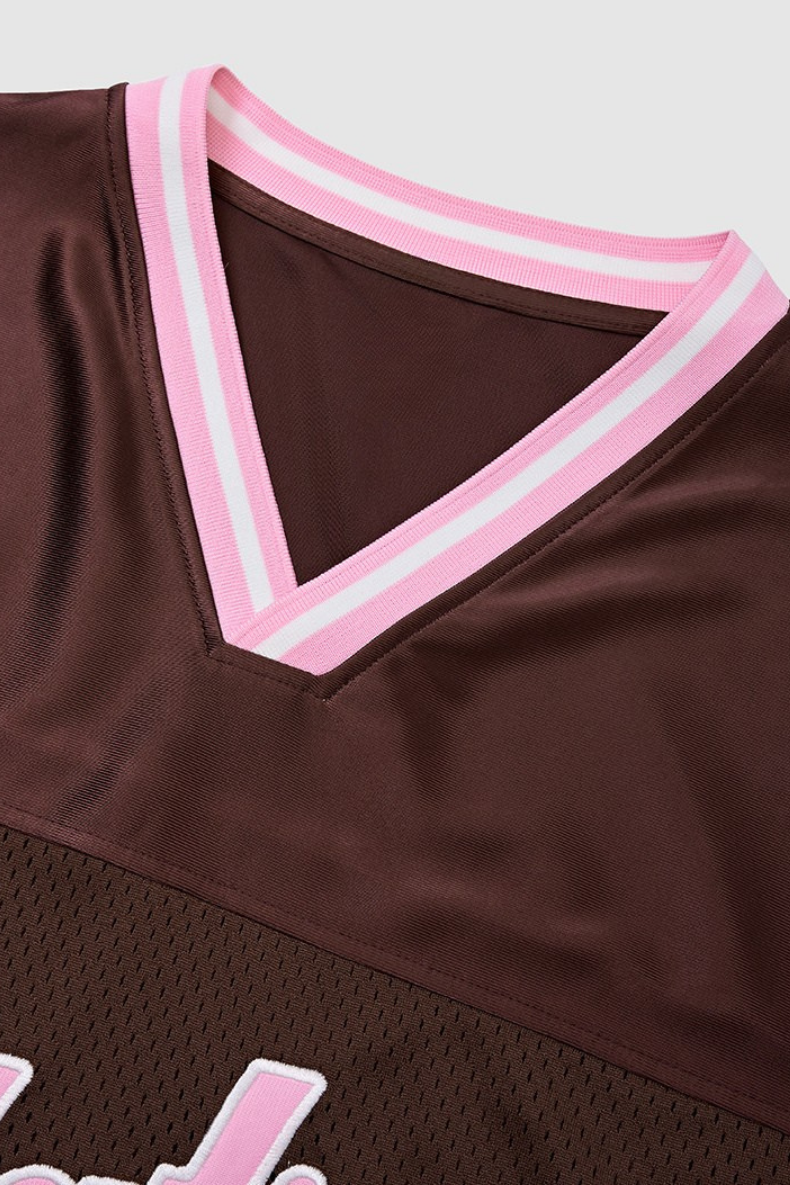Brown mesh varsity jersey with pink-and-white striped V-neck collar and breathable streetwear fabric
