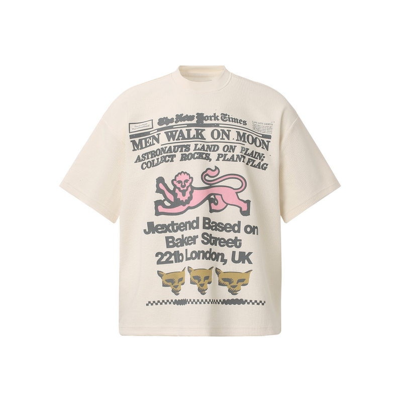 Cream waffle tee with vintage newspaper-style graphic, pink lion print, and retro text details