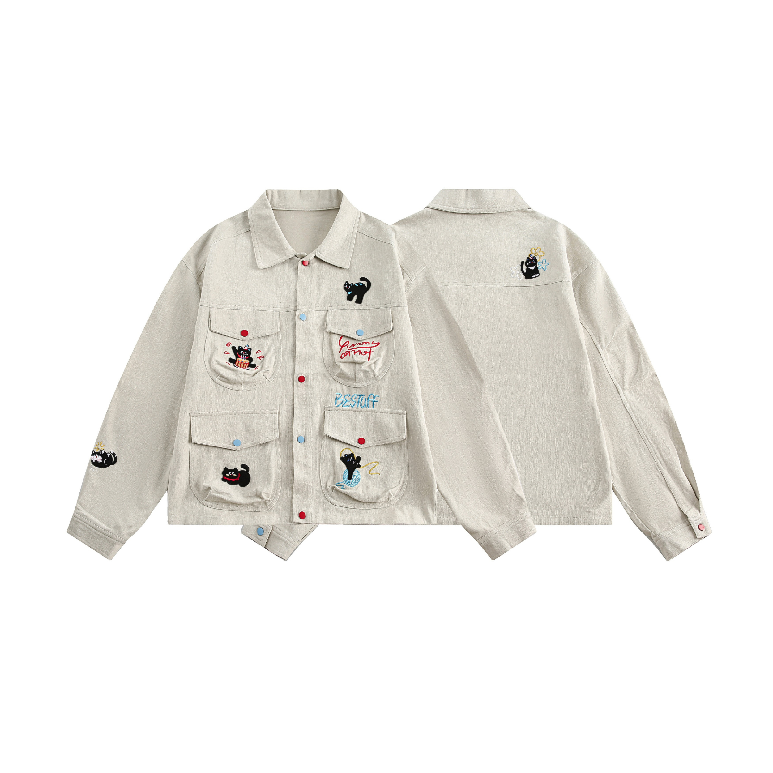 Cream cotton utility jacket with black cat cartoon embroidery patches, multi-pocket front, and contrast snap buttons, shown f