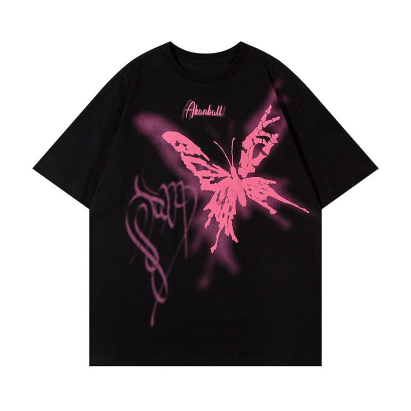 Black oversized tee with a pink butterfly graffiti graphic and streetwear lettering on the chest