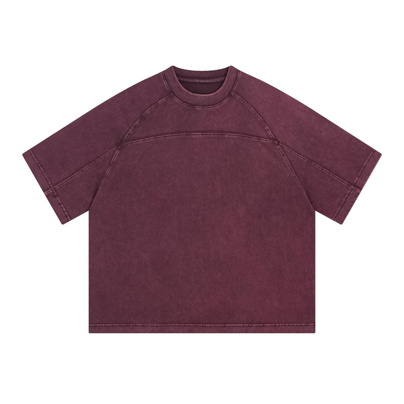 Vintage washed maroon oversized cotton T-shirt with raglan sleeves and visible seam detailing on a white background