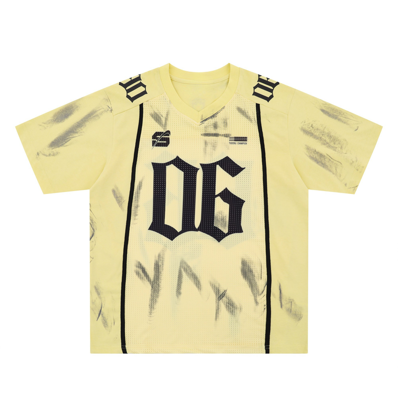 Yellow washed athletic mesh jersey tee with black graphic accents and oversized number print
