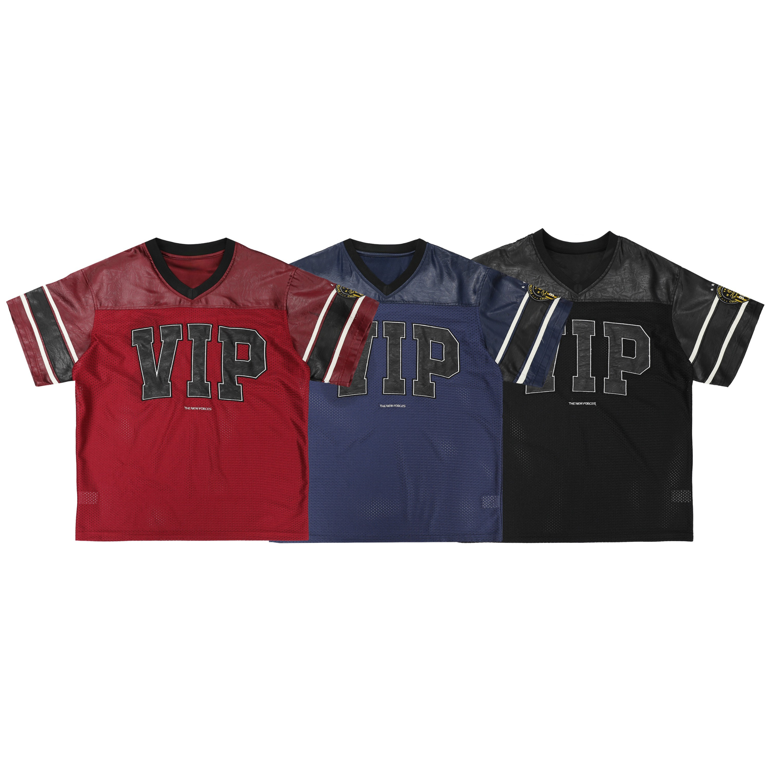 Black VIP mesh football tee with leather-look shoulder panels, varsity front graphic, and striped sleeves laid flat on white