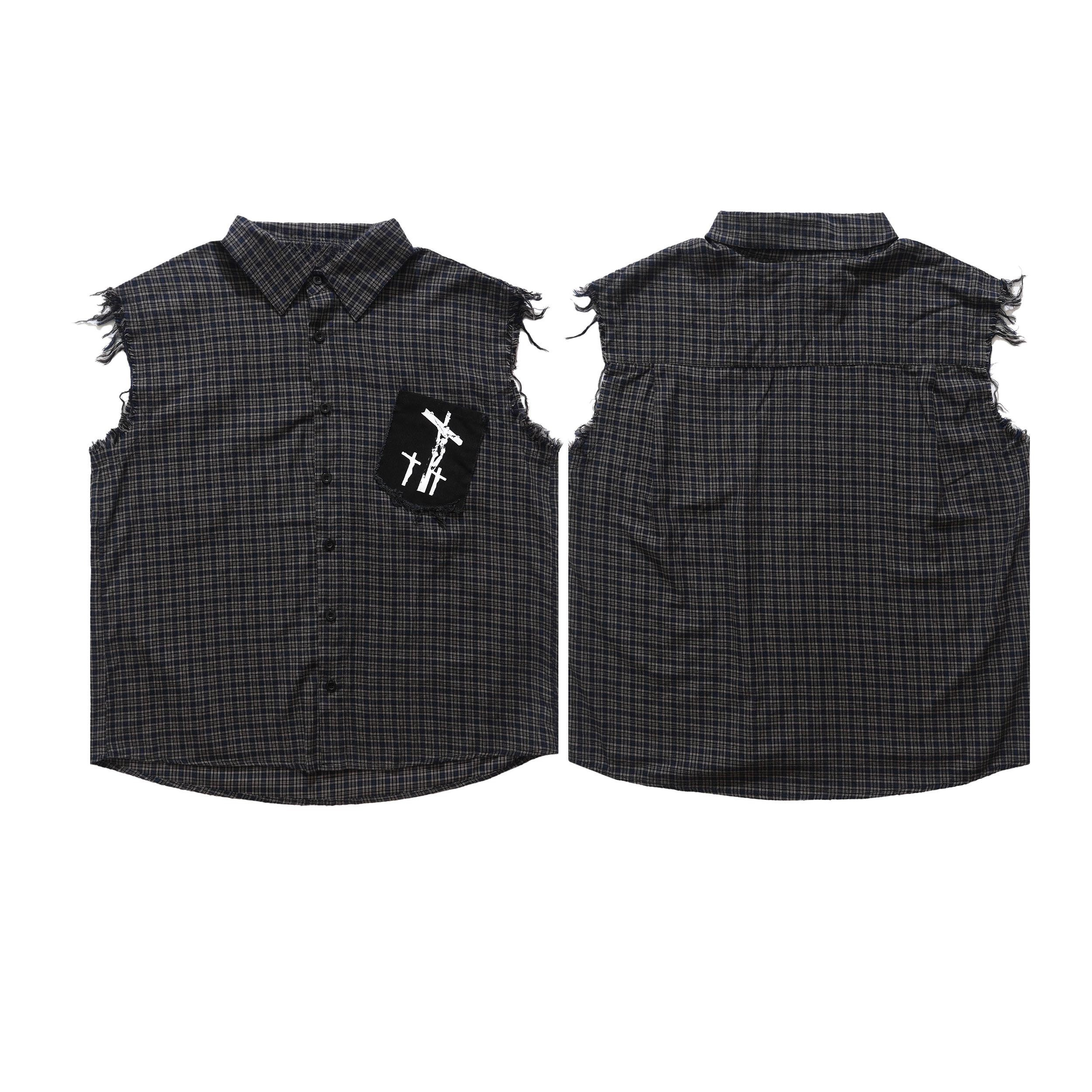 Dark plaid raw-edge sleeveless cotton shirt with frayed armholes and a black three-cross graphic chest patch, front view