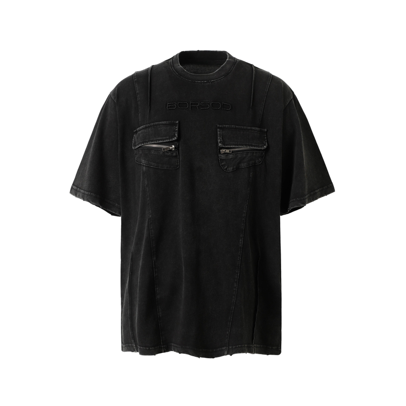 Black washed oversized tee with embroidered logo and dual zip chest utility pockets on a white background