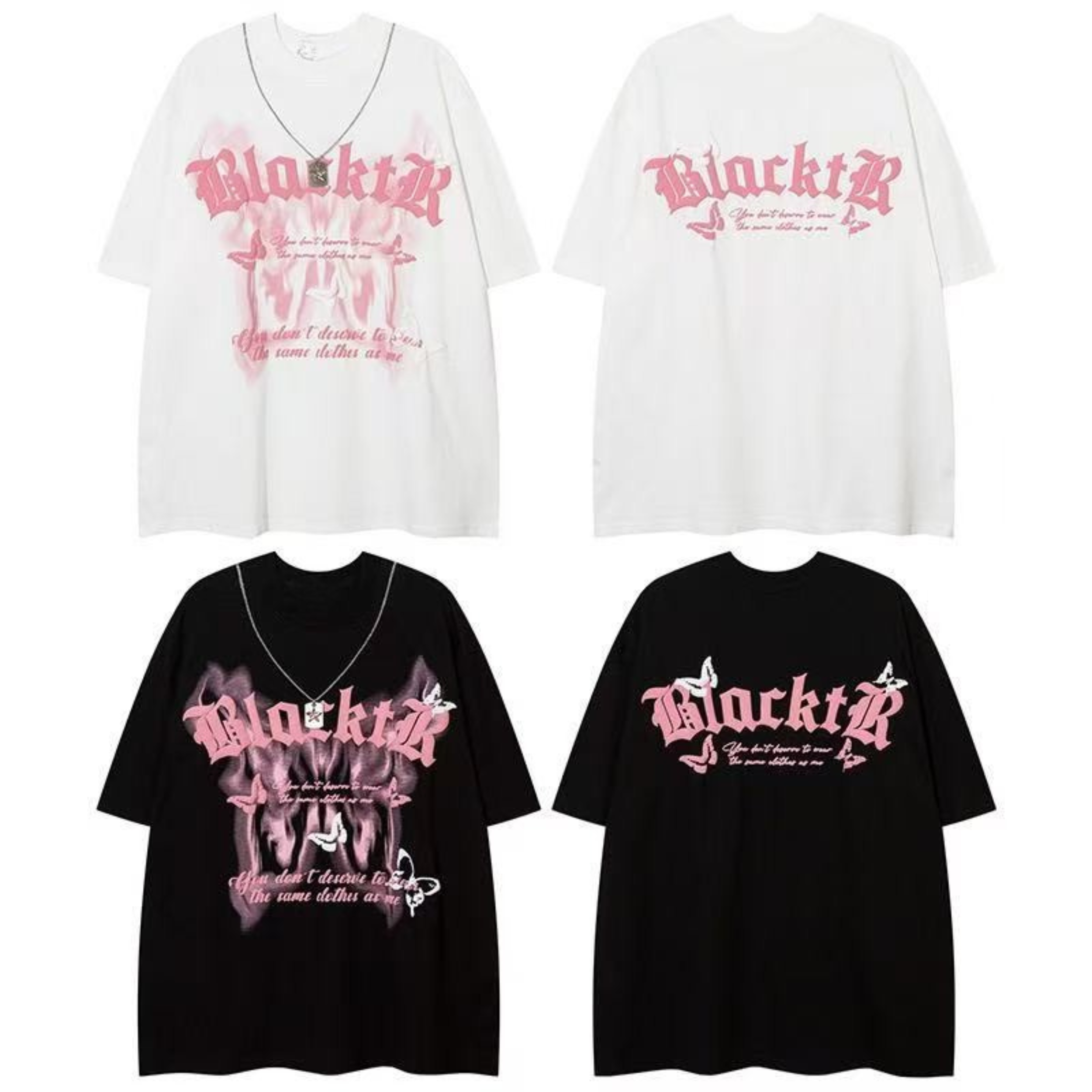 White oversized gothic butterfly graphic tee with pink spray-print design, gothic lettering, and chain necklace styling acces