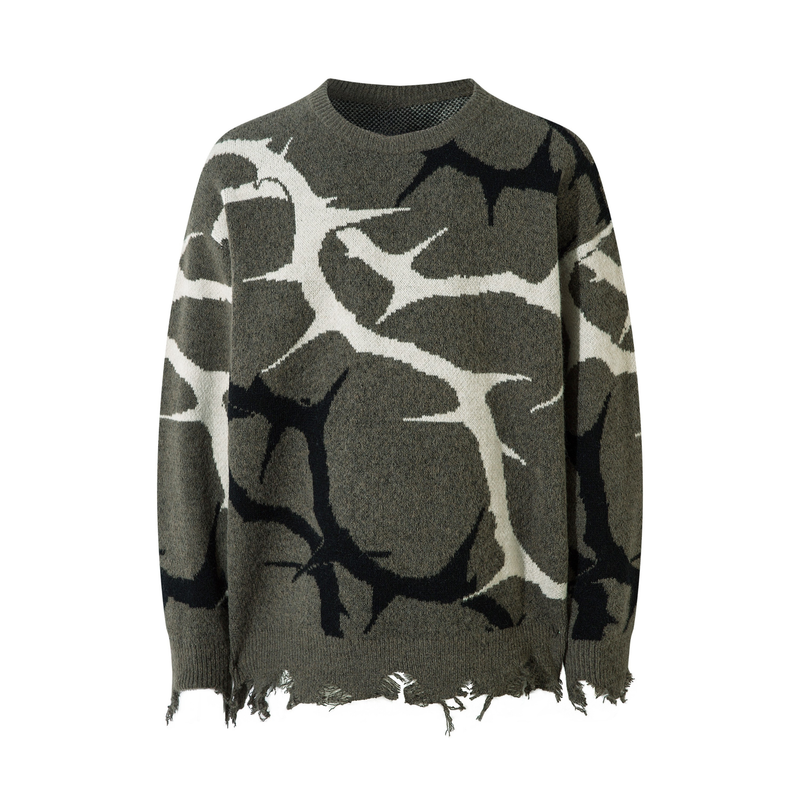 Oversized crew neck knit sweater with olive, white and black abstract camo pattern, front view