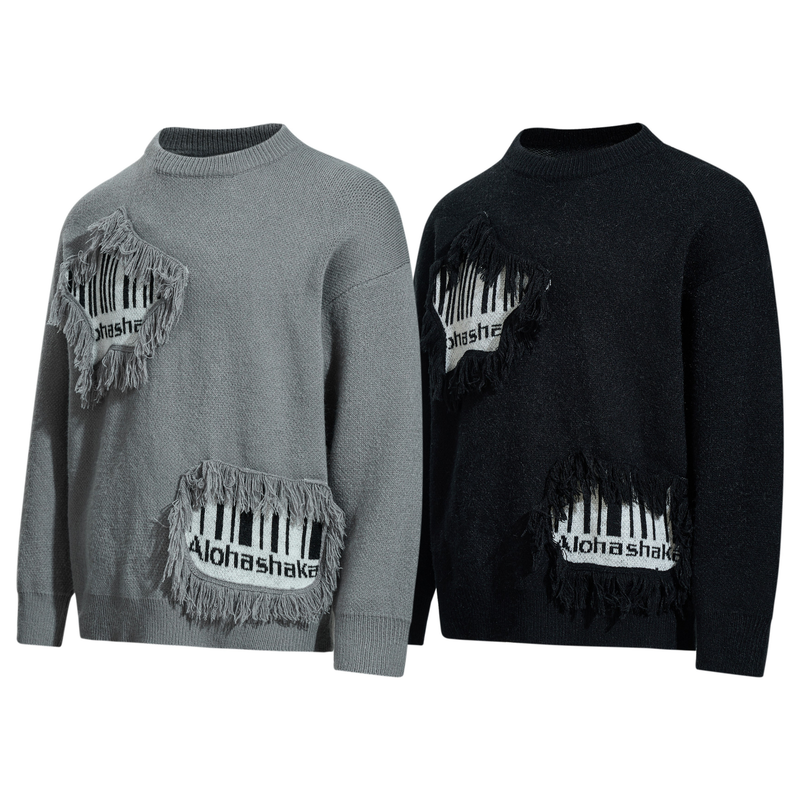 Gray and black knit sweaters with fringe patch graphics shown front view