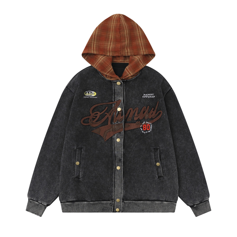 Black varsity jacket with brown plaid hood and chenille chest patches, front view