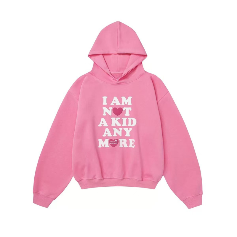 Pink pullover hoodie front view with stacked white text and heart graphic