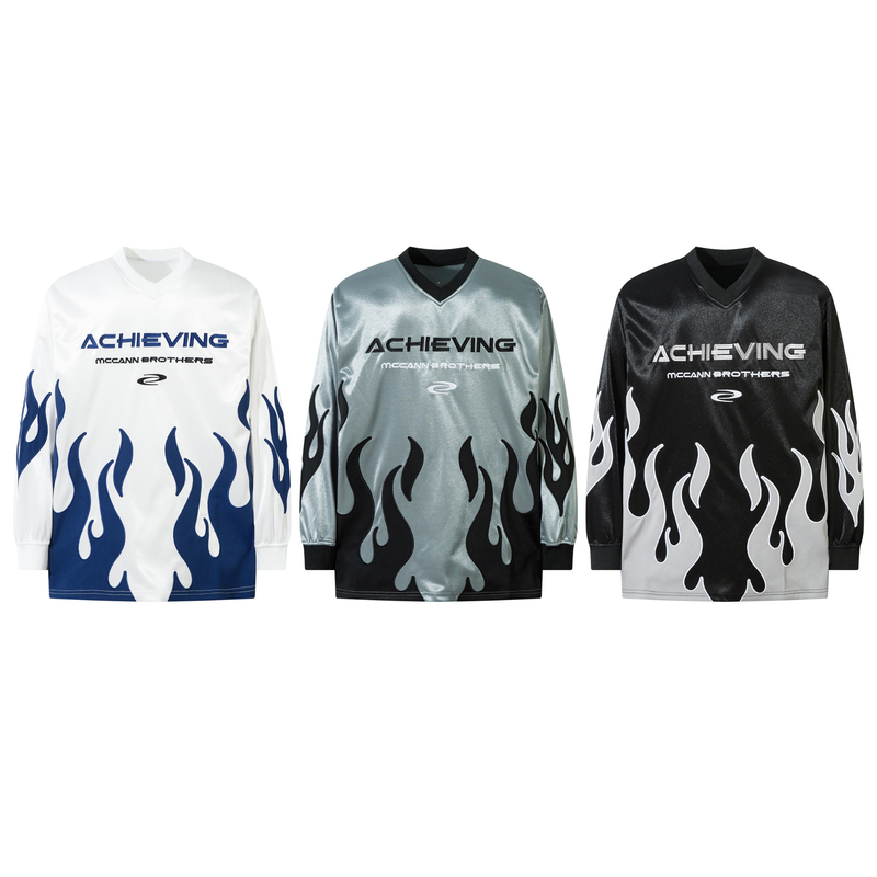 Three long sleeve jerseys shown front view in white, silver, and black colorways