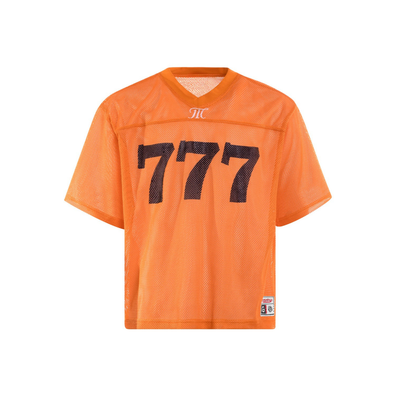 Orange mesh football jersey with black 777 print and V-neck, styled as a streetwear sports top