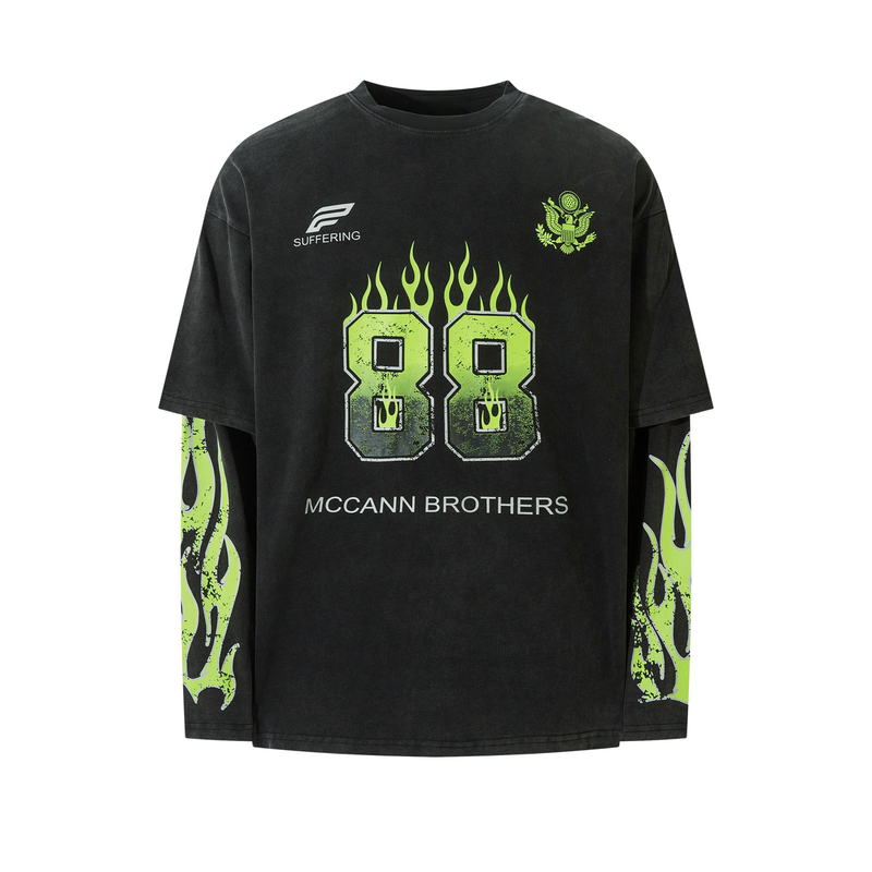 Front view of black long sleeve tee with neon green flaming 88 graphic and McCann Brothers text