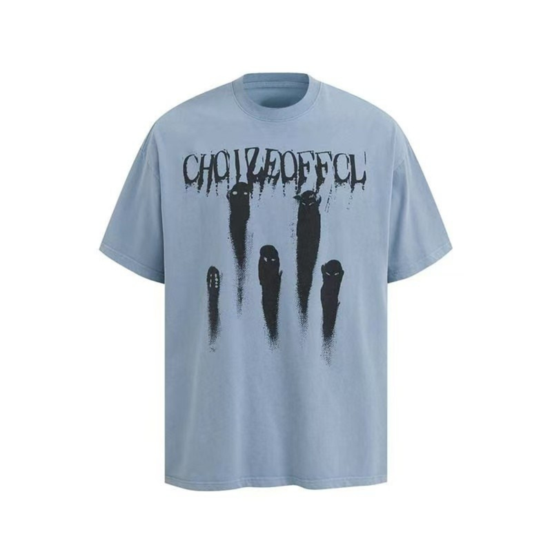 Light blue graphic tee with dripping ghost figures and bold black streetwear print on the chest