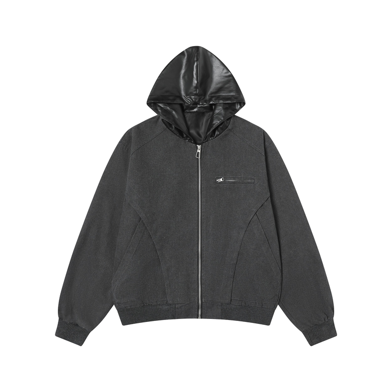 Front view of black hybrid hooded zip jacket with faux leather hood and chest pocket