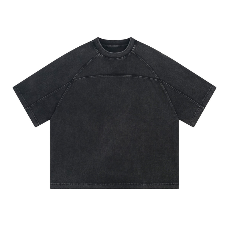 Vintage washed black oversized cotton T-shirt with raglan sleeves and a relaxed streetwear fit