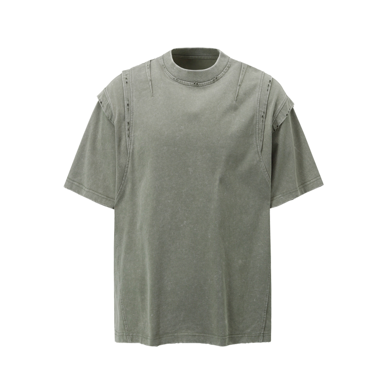 Vintage washed olive green panel tee with distressed seams and oversized short sleeves on a white background