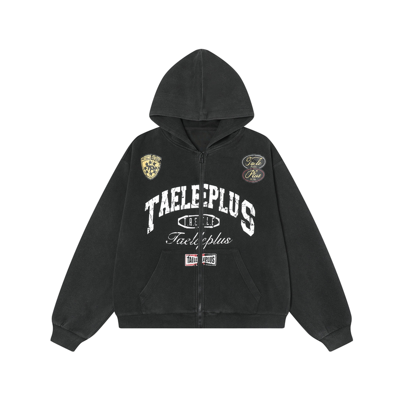 Black zip-up hoodie front view with distressed varsity-style graphics and badge patches