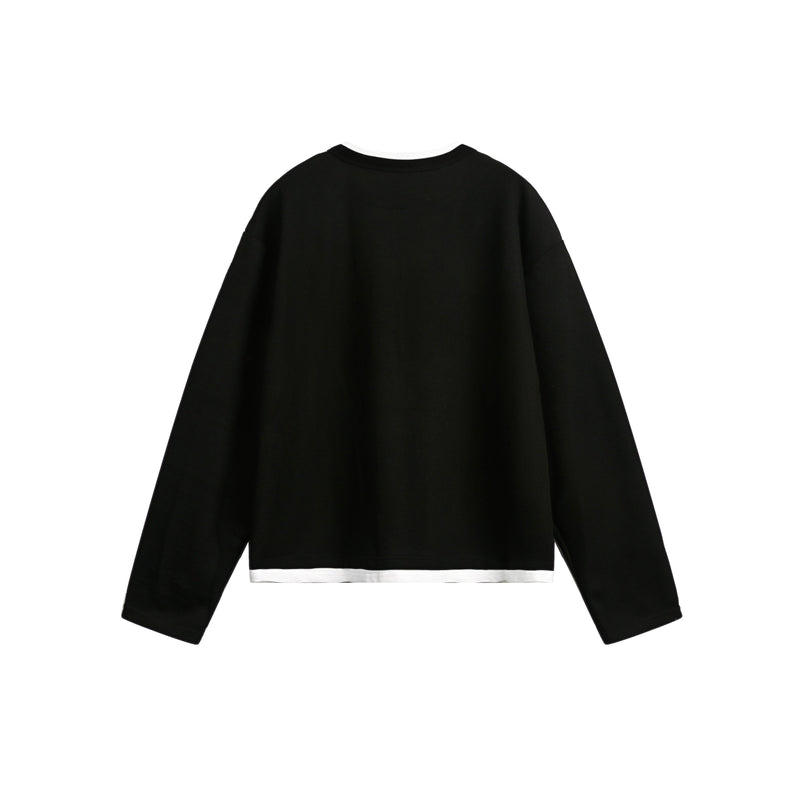 Black cropped long-sleeve sweatshirt with white hem, back view