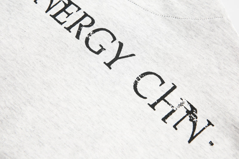 Diagonal back text print detail on light gray long-sleeve tee