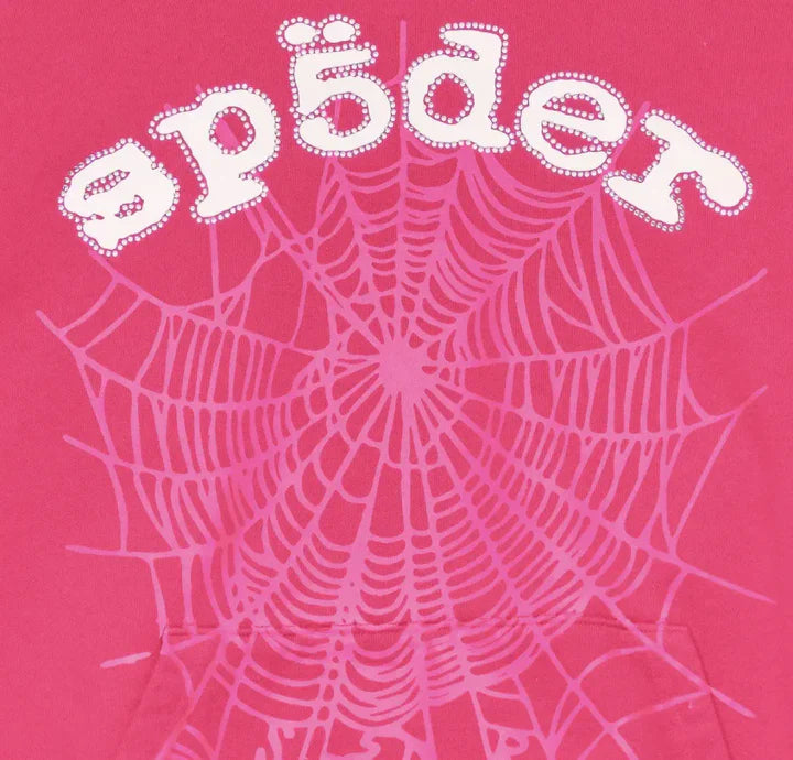 The Sp5der Web Hoodie – Hot Pink 440GSM Heavyweight Streetwear Pullover features a pink background, "spider" in bold white text with a dotted outline, and a striking pink spiderweb graphic—perfect for bold streetwear fans.