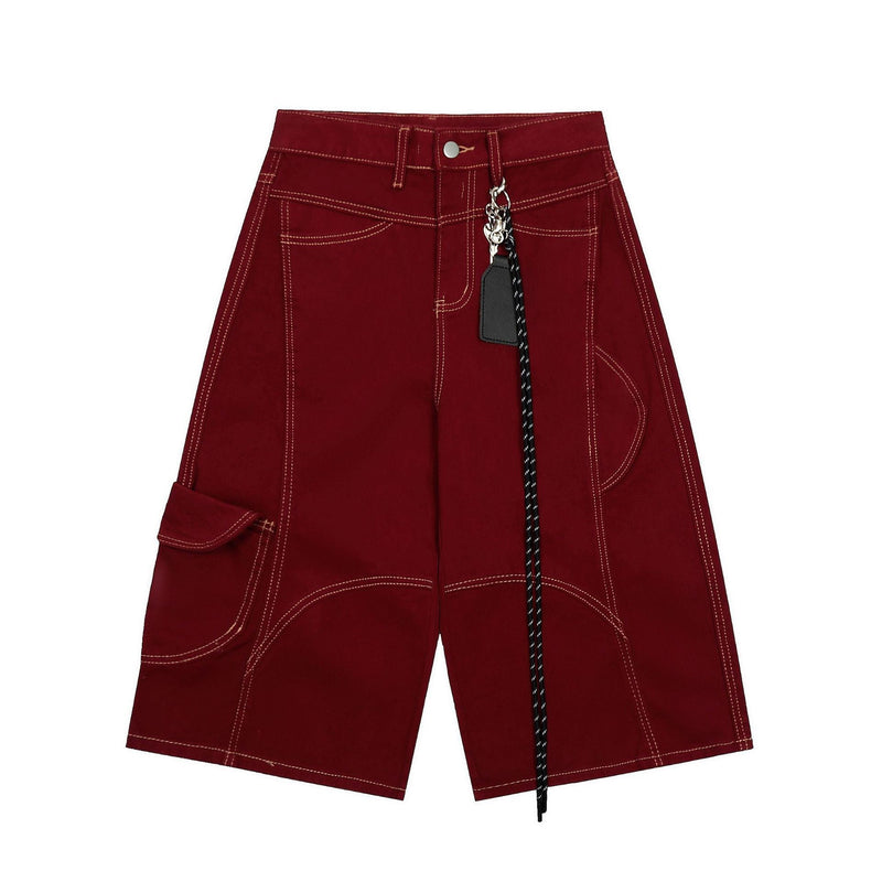 Burgundy utility cargo shorts with contrast stitching, front view and hanging keychain detail