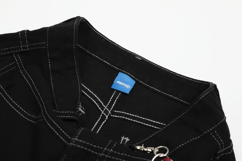 Inside waistband of black cargo shorts with blue label and contrast stitching