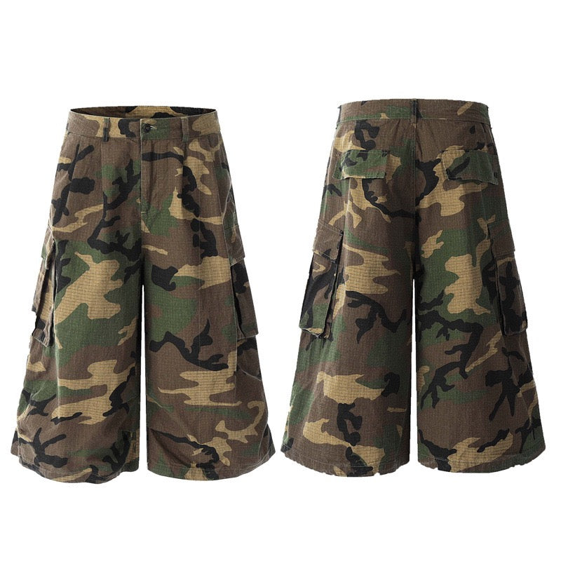 Front and back view of men's woodland camouflage wide-leg cargo shorts with dual side cargo pockets