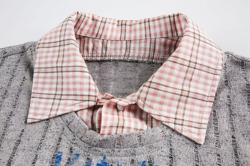 Close-up of a gray mesh graphic tee with a pink plaid collar and bow detail, featuring a vintage streetwear look