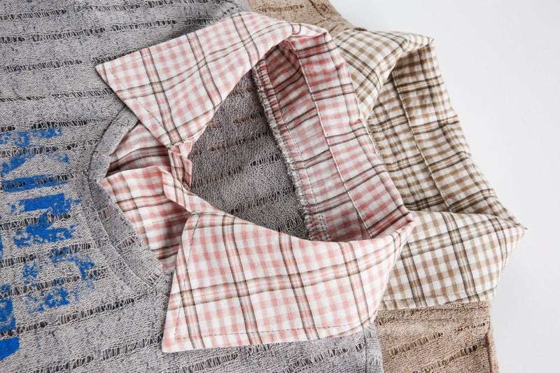 Vintage streetwear mesh graphic tee with plaid collar detail in gray, pink, and brown patchwork layers