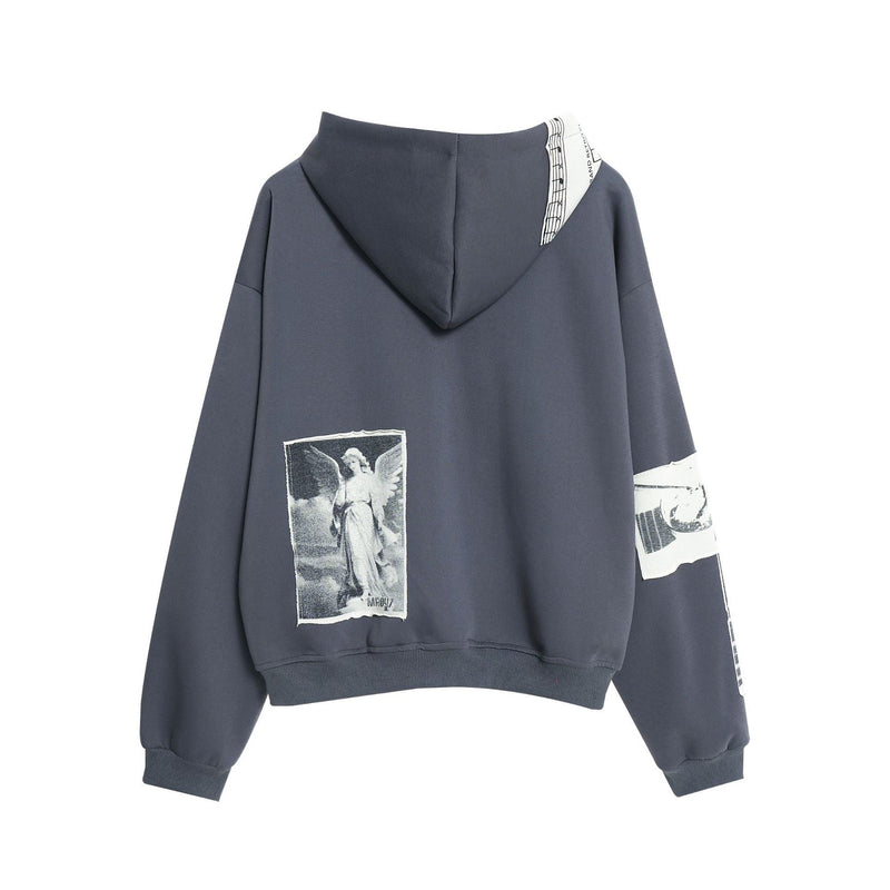 Dark gray zip hoodie back view with a collage patch on the lower back and sleeve detail
